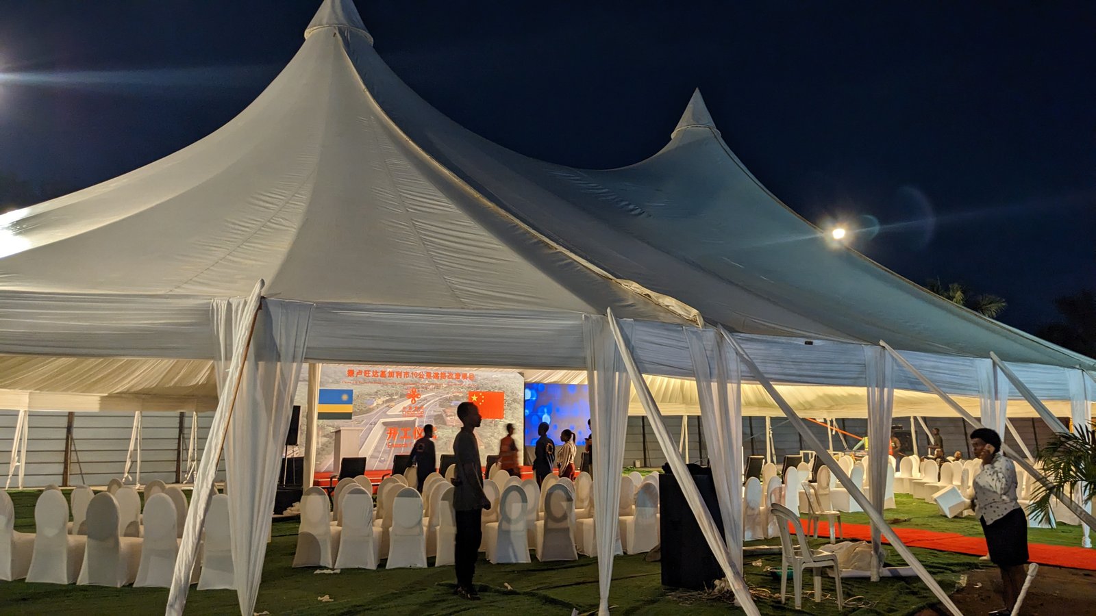 Large marquee tent set up for a corporate event in Kigali at night